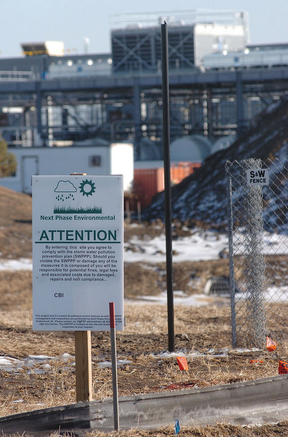 Sign calls attention to Storm Water Pollution Prevention Plan.